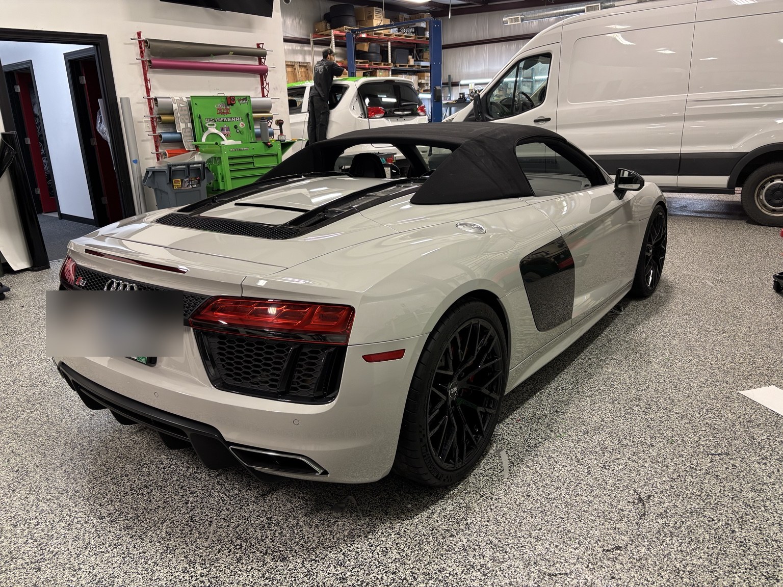 2018 Audi R8 wrapped in 3M 2080 Hi-Gloss Grey, rear three-quarter view in the shop
