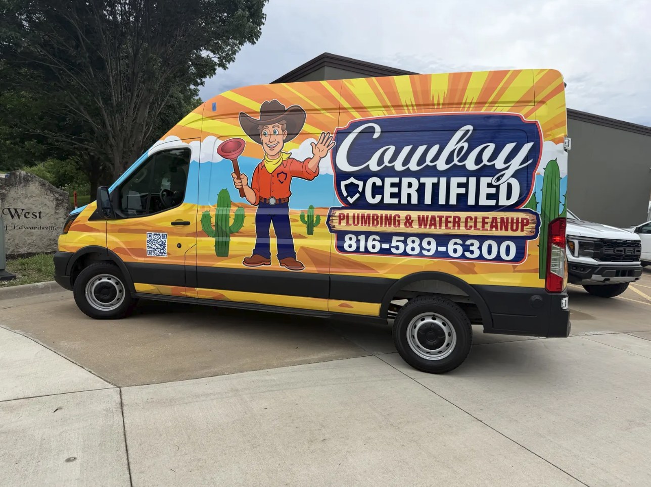 2023 Ford Transit van printed wrap for Cowboy Certified Plumbing and Water Cleanup, cowboy mascot graphic over a desert sunburst design